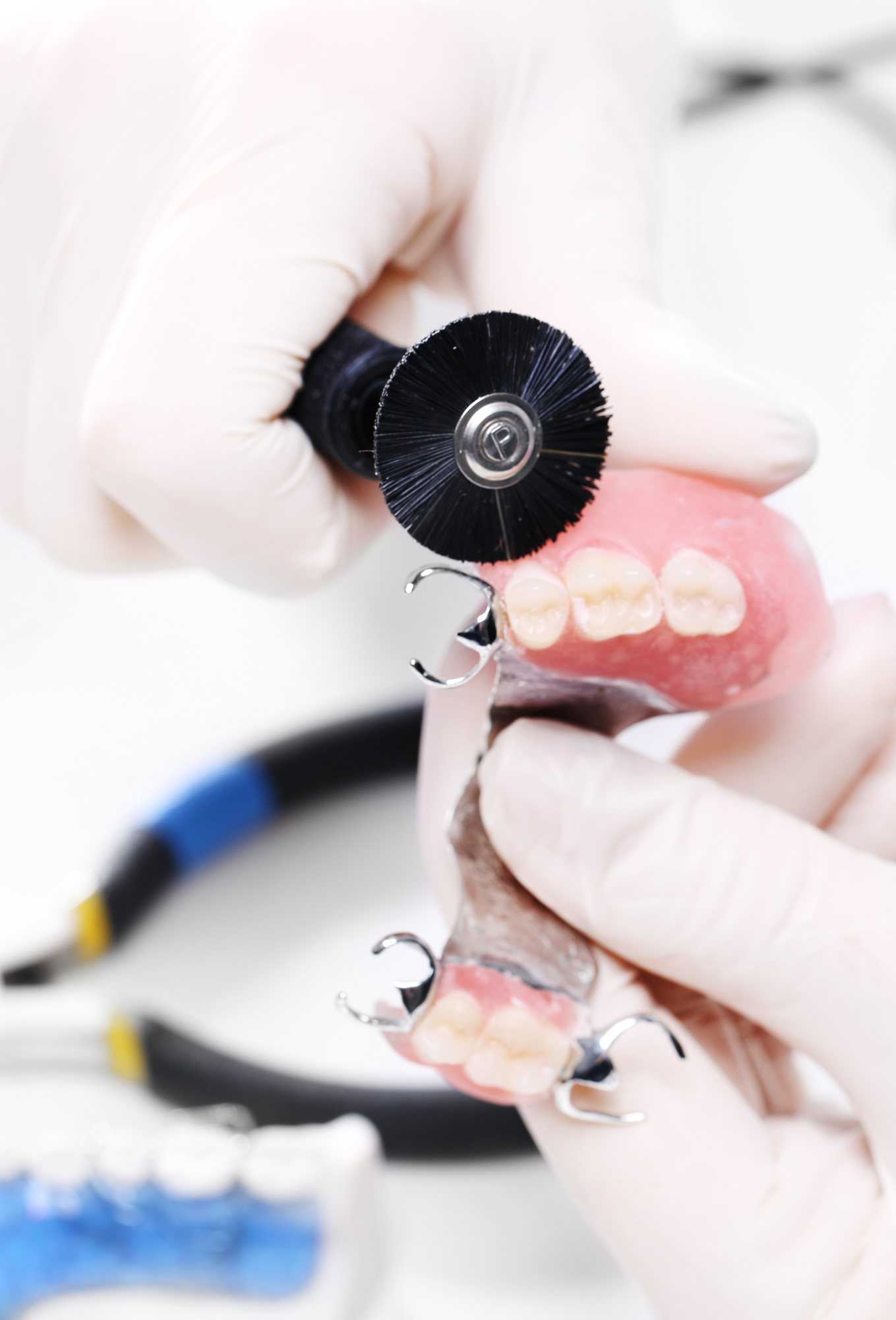 Dentist preparing partial denture