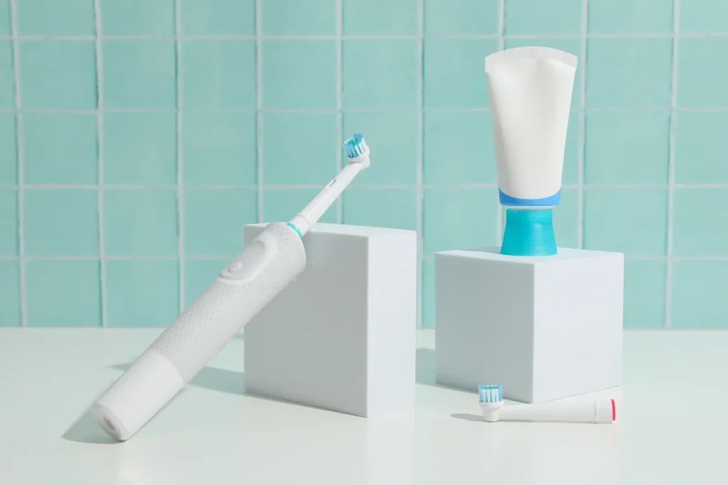An electric toothbrush in a bathroom
