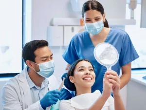 Patient sitting happily in the dental chair after overcoming fear of the dentist