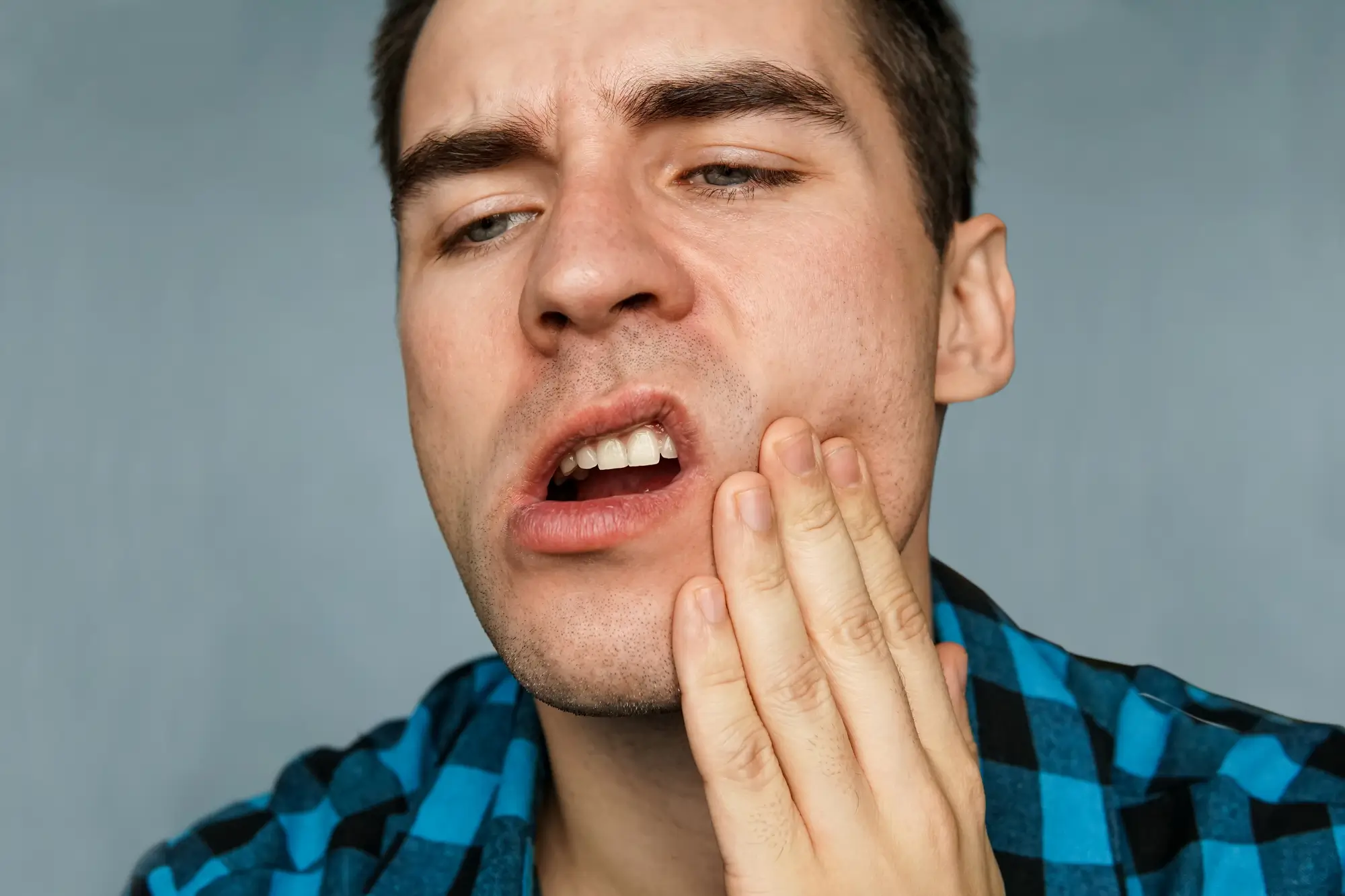 Patient with toothache caused by a dental granuloma