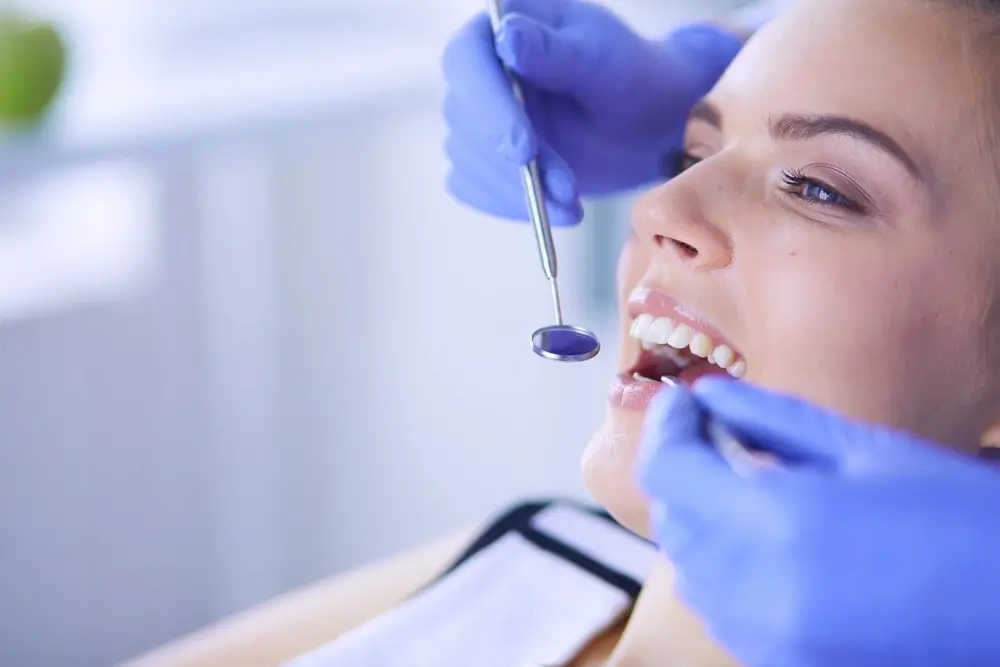 Dentist examining a patient at OrthoDental